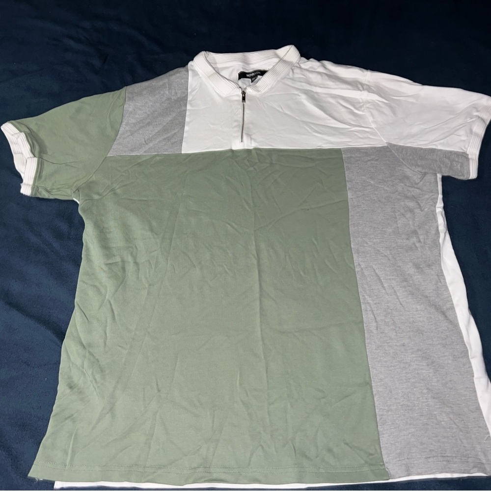 Short sleeve zip front polo